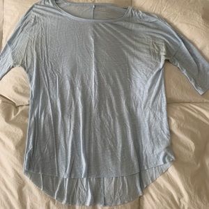Quarter sleeve light blue shirt